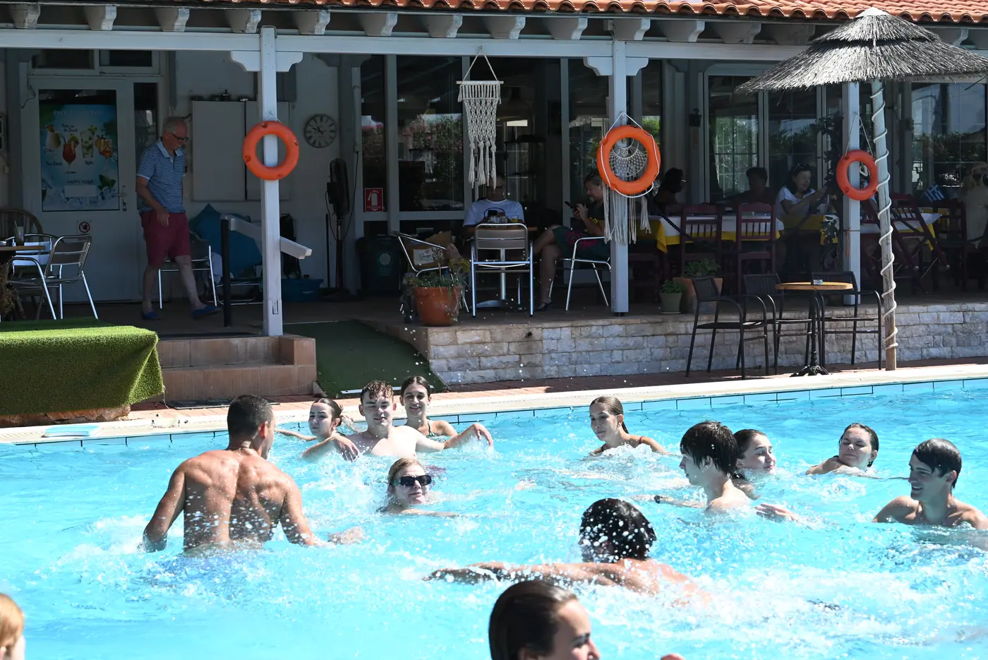 Day 5 in Sounio, at the shared international meal prepared by the four national teams. Photo 12 of 22.