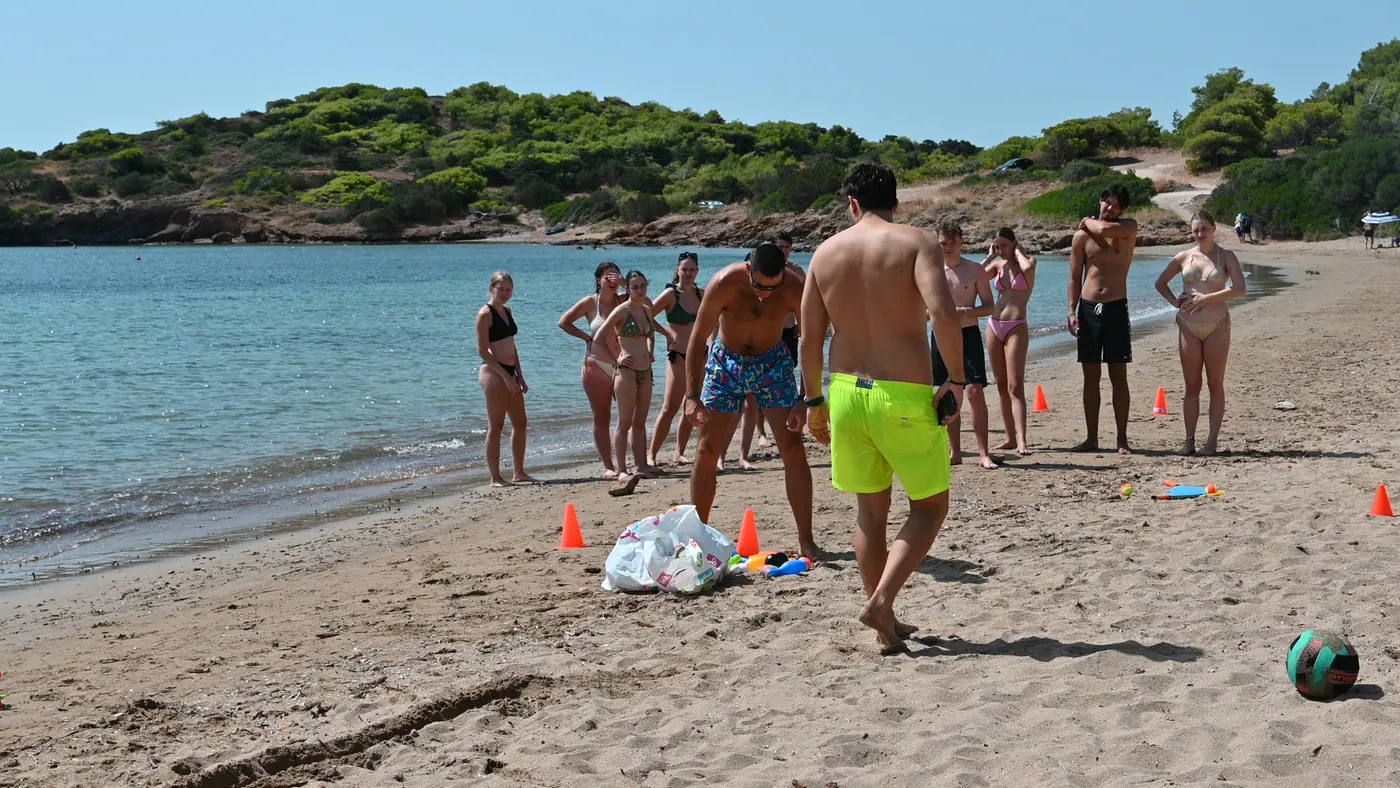 Day 7 on Sounio beach, where local people joined the group challenges. Photo 22 of 52.