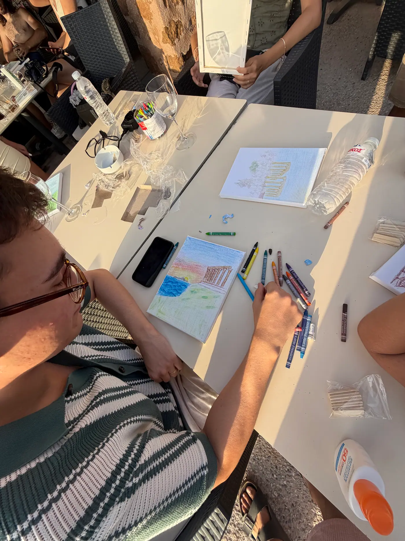 Day 7 in Sounio, where participants painted personal interpretations of the Temple of Poseidon on individual canvases. Photo 48 of 52.